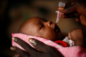 Child receiving polio vaccine